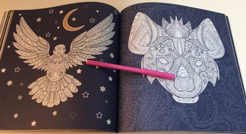 Some background detail has been added with the moon and stars printed in gold (not foil)